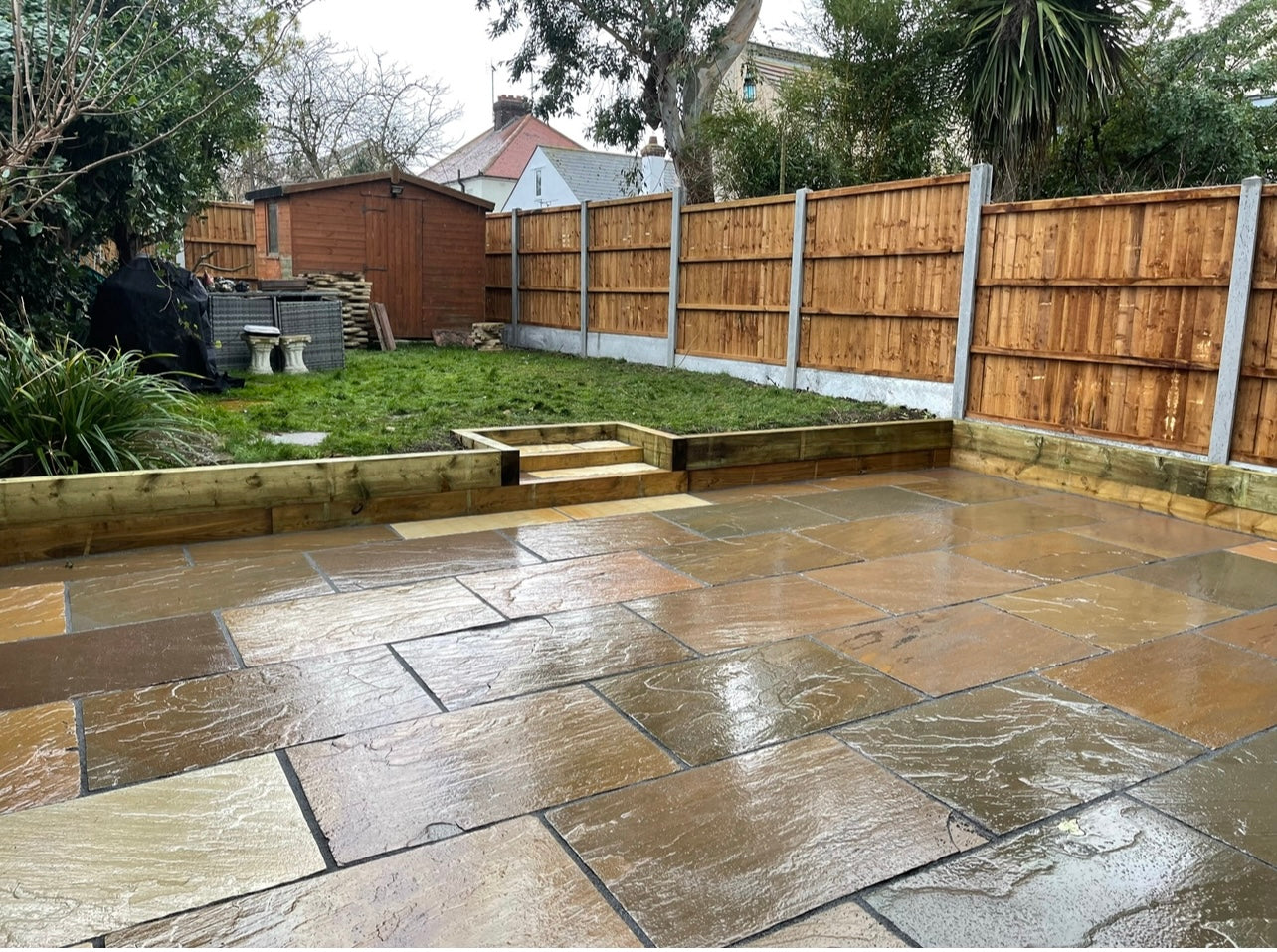 Raj Green Indian sandstone paving slabs 900x600 installed on garden patio