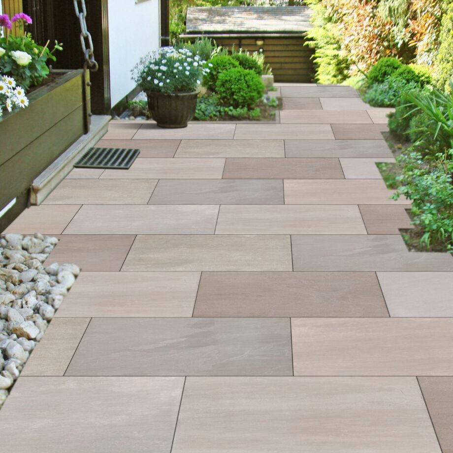 Raj Green porcelain paving slabs installed on outdoor garden patio
