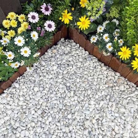 Close up of Polar White 20mm angular white marble gravel